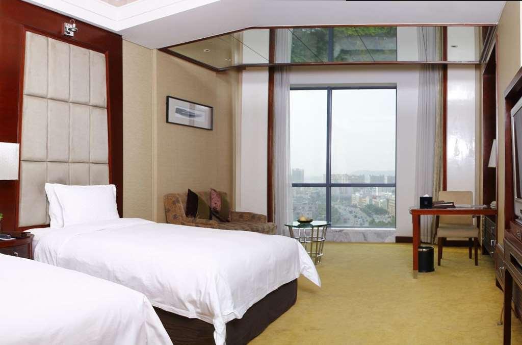 Grand Oriental Hotel Дунгуань Номер фото
