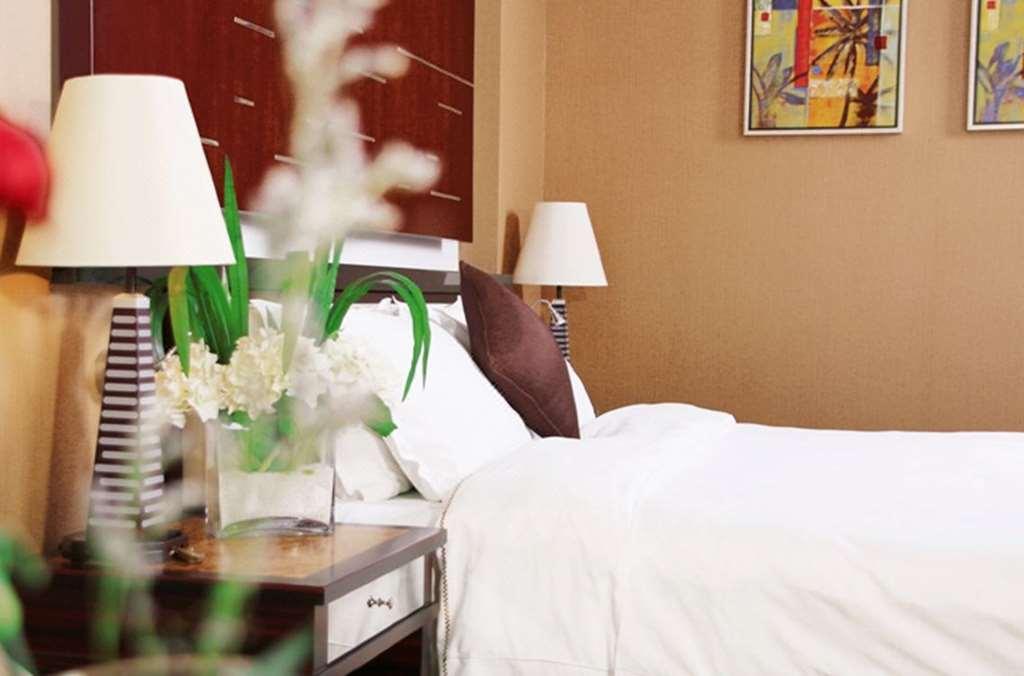 Grand Oriental Hotel Дунгуань Номер фото